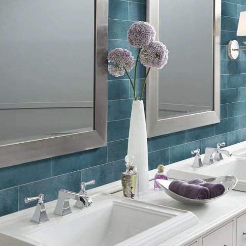 modern bathroom with teal tile walls